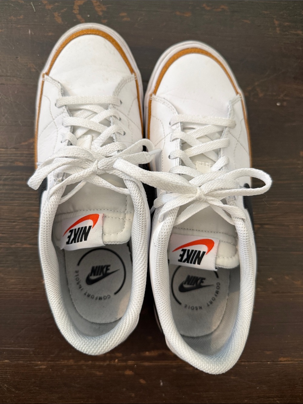 Nike White Sneakers with Tan Accent and Orange Logo